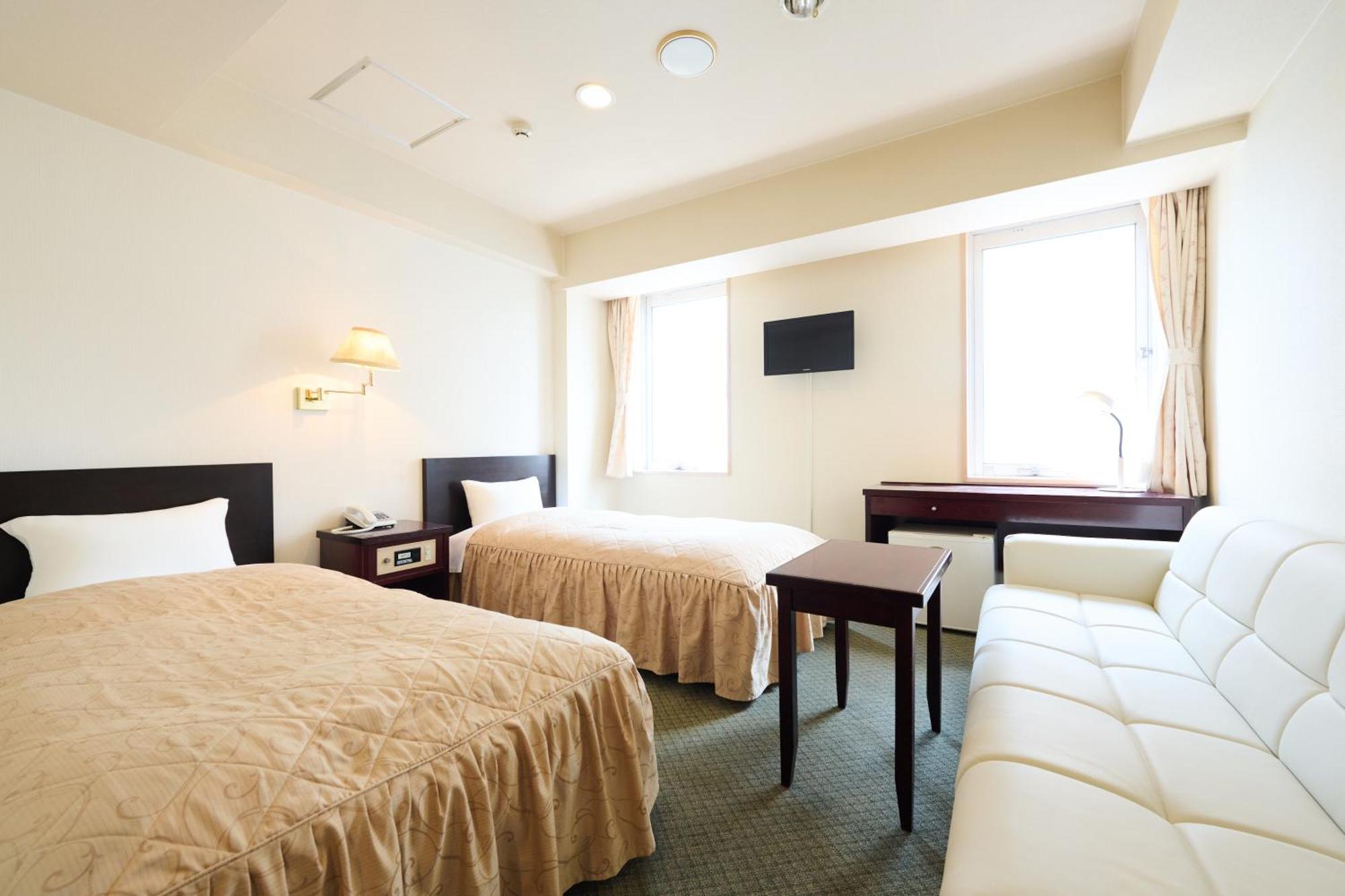 Hotel Sho Sapporo Quarto foto