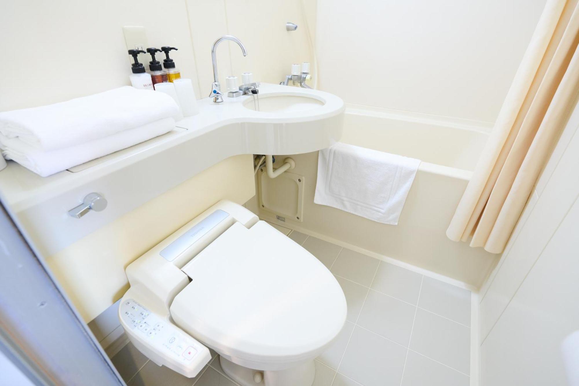 Hotel Sho Sapporo Quarto foto