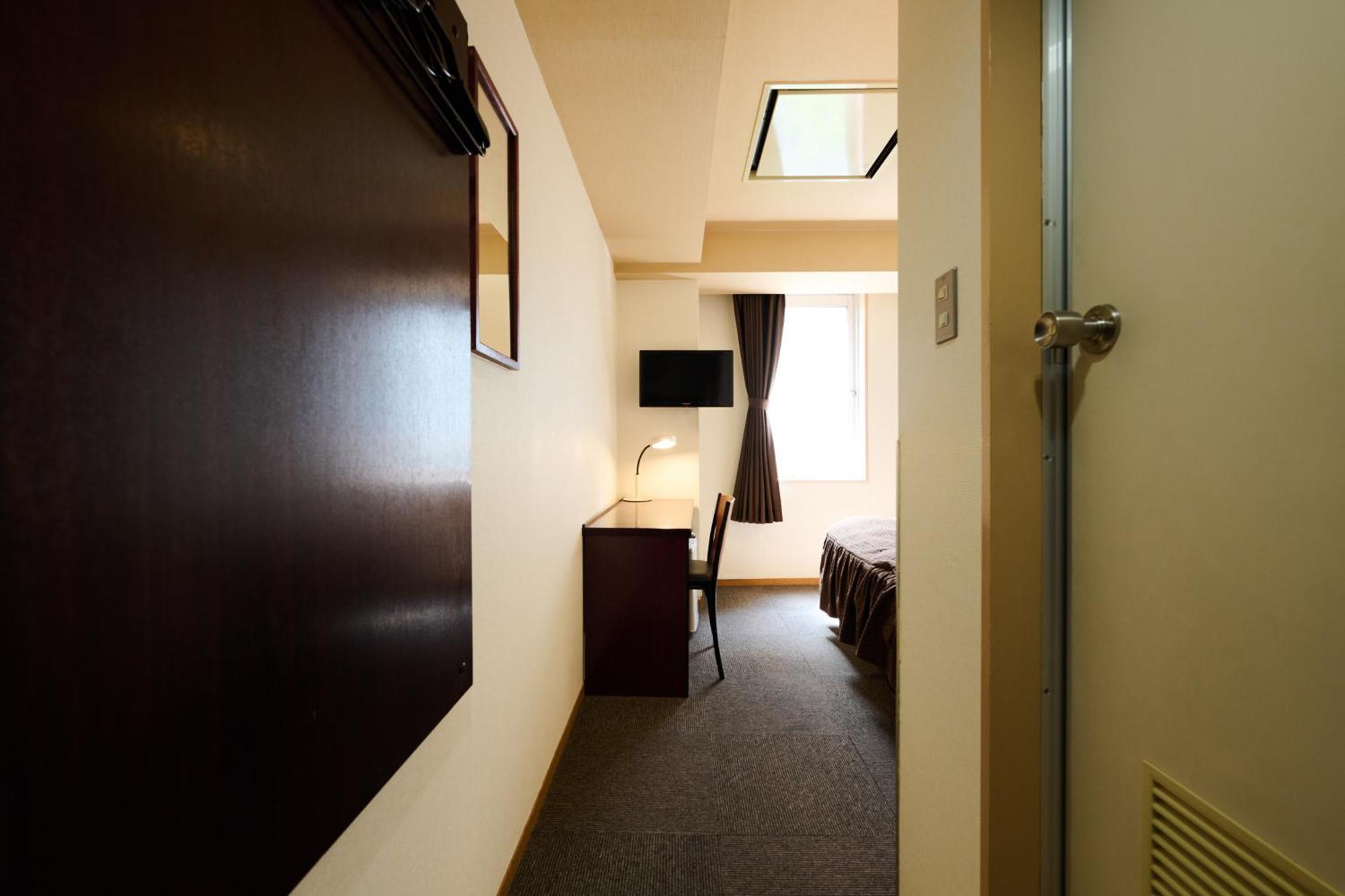 Hotel Sho Sapporo Quarto foto